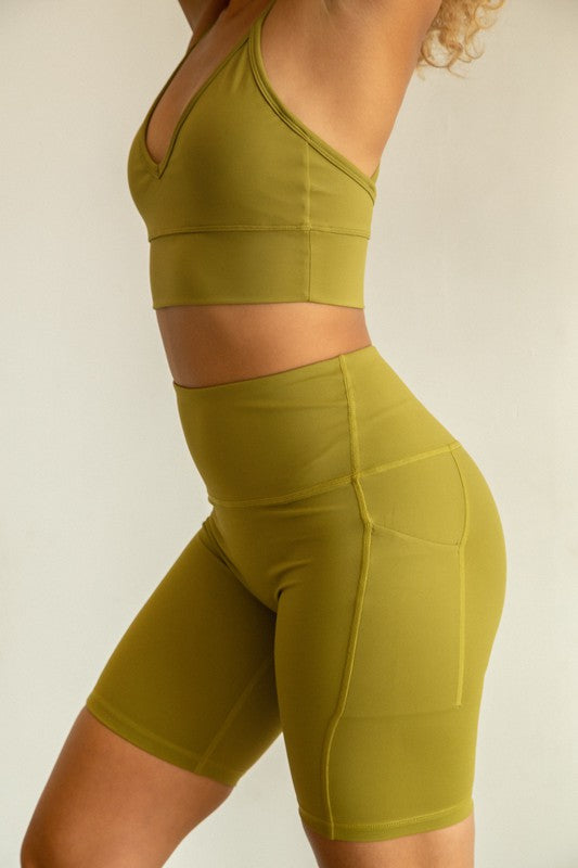 Yoga pants Short Side Pockets, High stretch retention, soft touch. available in black, olive, pastel blue sizes S-XL- nylon -spandex